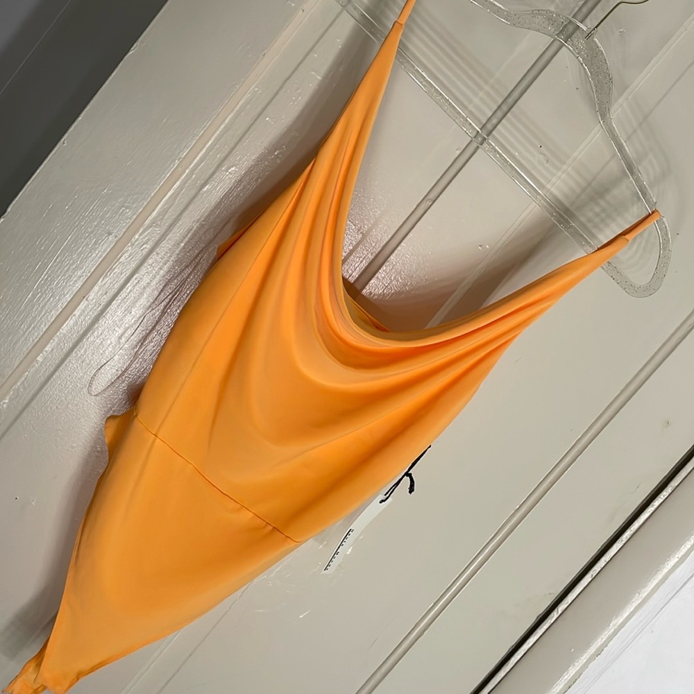 Orange body suit